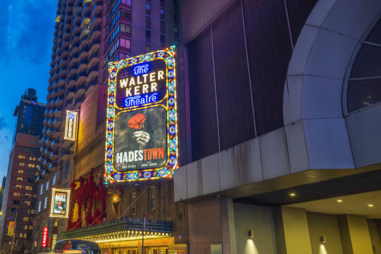 Beautiful night view of the Walter Kerr Theatre with the vibrant LED advertisement of the "Hades Town" musical, in the heart of Broadway. New York. USA.