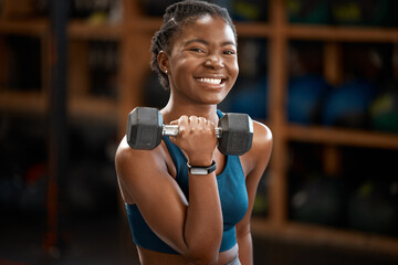 Black woman, smile and portrait with dumbbell for muscle, wellness or fitness health challenge in...