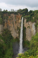 Sipisopiso waterfall at Tonging Village dropping to lake Toba, North Sumatra, Indonesia