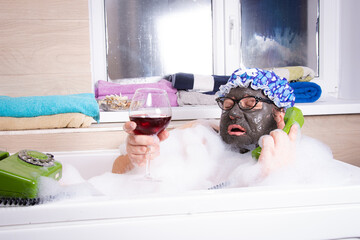 Relaxation and relaxation in the bath. Delicious drinks and gossip over the phone. Funny fat man is...
