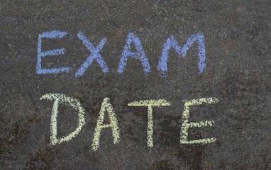Exam Date Phrase Written Blackboard with Chalk, Study or Education Concepts