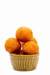 Indian Sweet Motichur Ladoo or Motichoor Laddu in a Bowl Isolated on White Background with Copy Space, Also Known as Bundi Ladoo