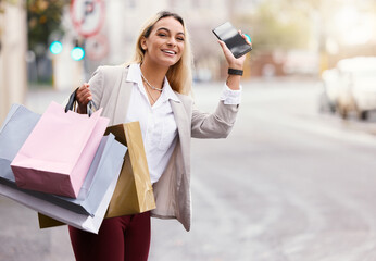 Taxi, shopping and hand of woman with bags in city for travel, service app or pickup. Fashion,...