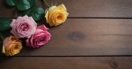 Colorful roses lie on a wooden background on the left, with free space for text on the right. 