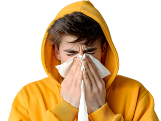 man in yellow hoodie wiping nose with tissue