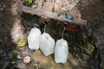 underground source of clean fresh water, filled canisters for a home supply of essential products,...