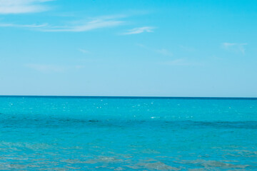 Blue sea with waves and sky. Ripples on blue water surface
