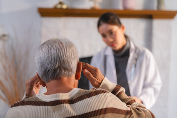 Senior Man Receives Medical Check-Up Therapy from Doctor in Hospital Clinic: Professional Health Care Service for Elderly Patients Facing Health Problems, with Comprehensive Exams and Consultations