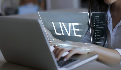 Content creator using Live Streaming platform for business promotion concept, with laptop live...