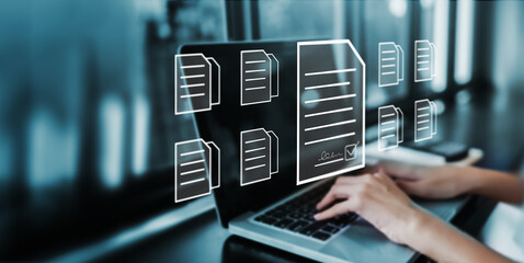 E-document in business transactions as a businessman efficiently signs digital smart contracts using electronic signature technology. Agreements in modern corporate management, while using laptop.
