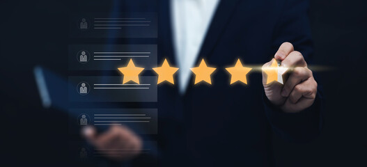 Businessman giving online customer reviews giving stars evaluating product shop, services,...