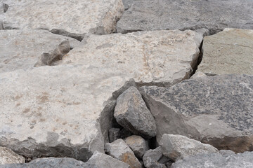 puzzle like hewn stones near the lake