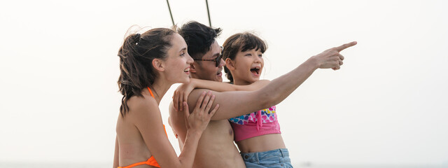 Caucasian family enjoy spending a quality wellbeing vacation holiday trip on a sailboat or yacht...