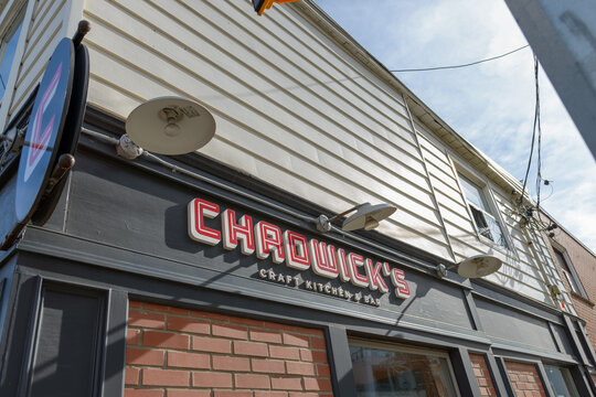 exterior building and sign of Chadwick's Craft Kitchen & Bar, a restaurant, located at 268 Howland Avenue (at Dupont Street) in Toronto, Canada