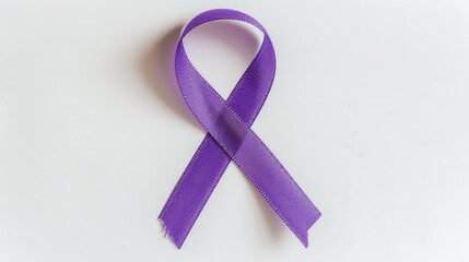 A purple ribbon symbolizing support for various causes like animal abuse Alzheimer s disease domestic violence epilepsy lupus sarcoidosis Crohn s disease and pancreatic cancer stands out ag