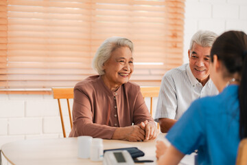 Senior Man Receives Medical Check-Up Therapy from Doctor in Hospital Clinic: Professional Health Care Service for Elderly Patients Facing Health Problems, with Comprehensive Exams and Consultations