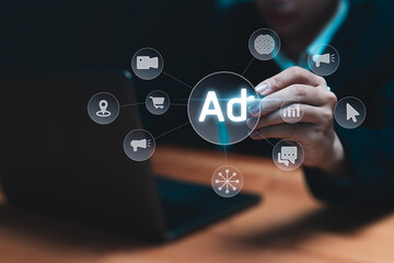 Online marketing and advertising concept.  Businessman using laptop planning strategy for future business promotion on websites and social media for traffic and awareness.