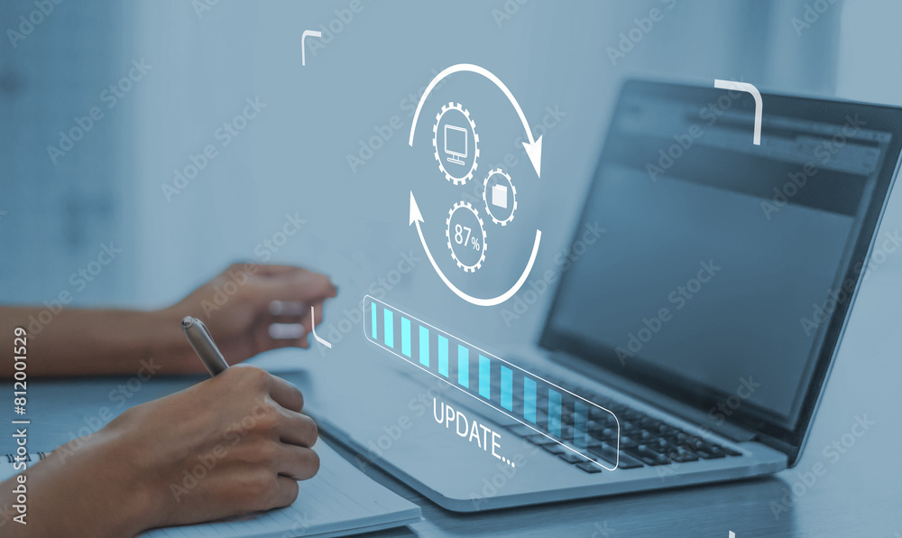  working in office desktop installing update system software for device operating systems to be up to