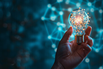 A hand is holding a light bulb with a network of lines coming out of it