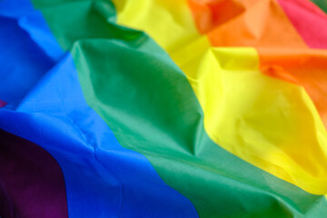 LGTBQ color flag pride month background. The lesbian, gay, bisexual, transgender, queer, intersex,...