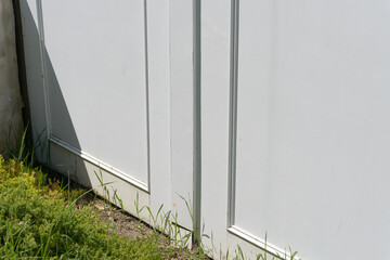 outdoors border wall with edge of grass lawn