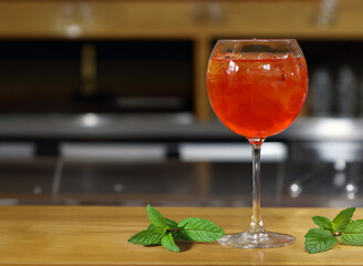 cocktail with ice in a glass on the bar counter