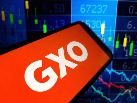 Konskie, Poland - May 11, 2024: GXO Logistics company logo displayed on mobile phone