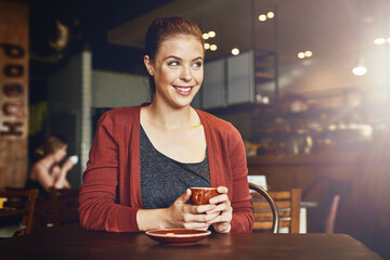 Woman, coffee shop and thinking with latte and happy customer with smile and table. Cup, restaurant and relax university student with college break, cafe and tea in store with hot drink and mug