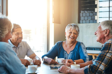 Mature, friends and group relax at coffee shop on holiday or reunion on vacation in retirement....