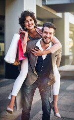 Shopping mall, piggy back and portrait of couple in city for clothing sale, discount deal and store...