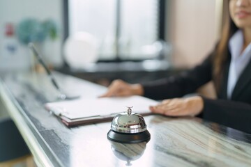 Hotel receptionist in uniforms at desk in lobby Friendly and welcome staff in hotel reception...