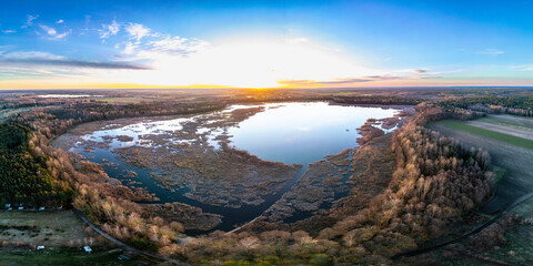 Sunset over the lake. View from the drone.