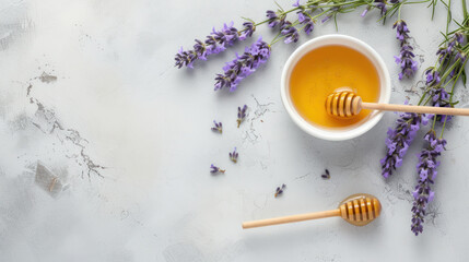 Obraz na płótnie Canvas Honey in the bowl wooden spoon