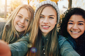 Girl, friends and selfie with portrait in nature for profile picture update, social media post and holiday memory with smile. Group, people and happy with photography on winter vacation with bokeh