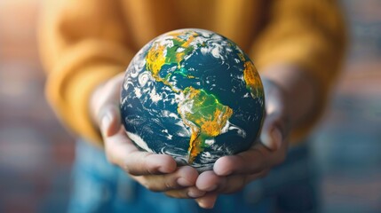 Close up a person holding a globe in their hands, global investment and sustainability opportunities