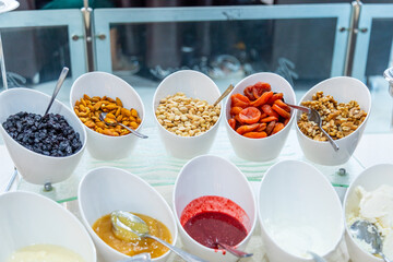 Assorted Nuts and Dried Fruits in Bowls