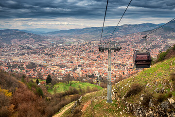 a scenic ride on Sarajevo's iconic cable car, offering panoramic views of the cityscape below.