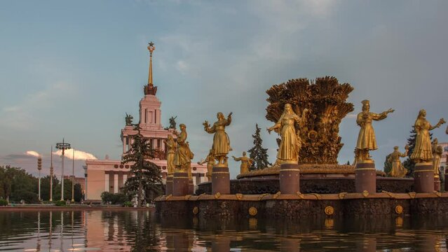Fountain Friendship of peoples at sunset. One of the main symbols of the Soviet era. Sixteen female statues of the fountain represent the 16 Soviet republics. Timelapse. Moscow. Russia.