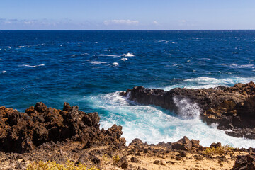 Rocky, volcanic Atlantic ocean coast. Charco de Palo region. Lanzarote, Canary Islands, Spain