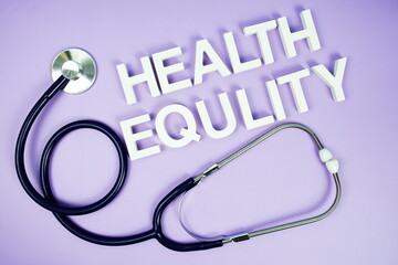 Health Equlity alphabet letters and stethoscope on purple background, Healthcare concept