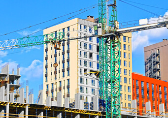 Naklejka premium Building crane and construction