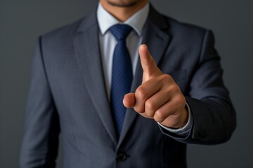 Businessman Pointing Finger Forward in Suit