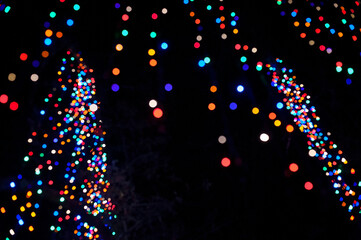 Colorful Christmas lights in vibrant bokeh at night