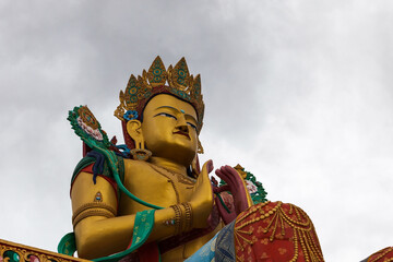 A statue of Maitreya Buddha at Diskit Monastery, Nubra Valley, Ladakh, India. Close view.