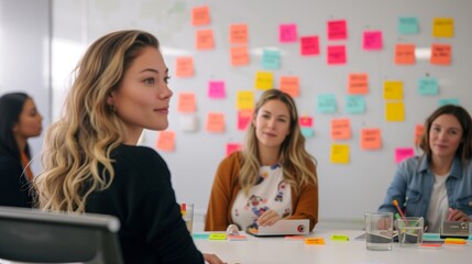 Young Female Professional Leading a Team Meeting