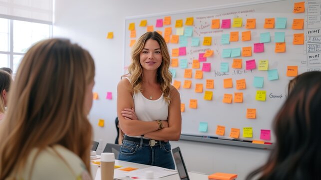 Young Female Professional Leading a Team Meeting