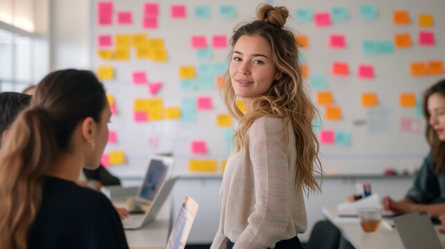 Young Female Professional Leading a Team Meeting