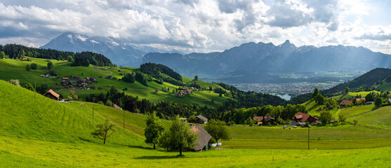 view on Alps over lake Thun during spring in Switzerland