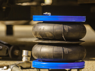 Car in service. Installing air ride suspension.