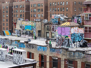 Lower East Side graffitied building tops 